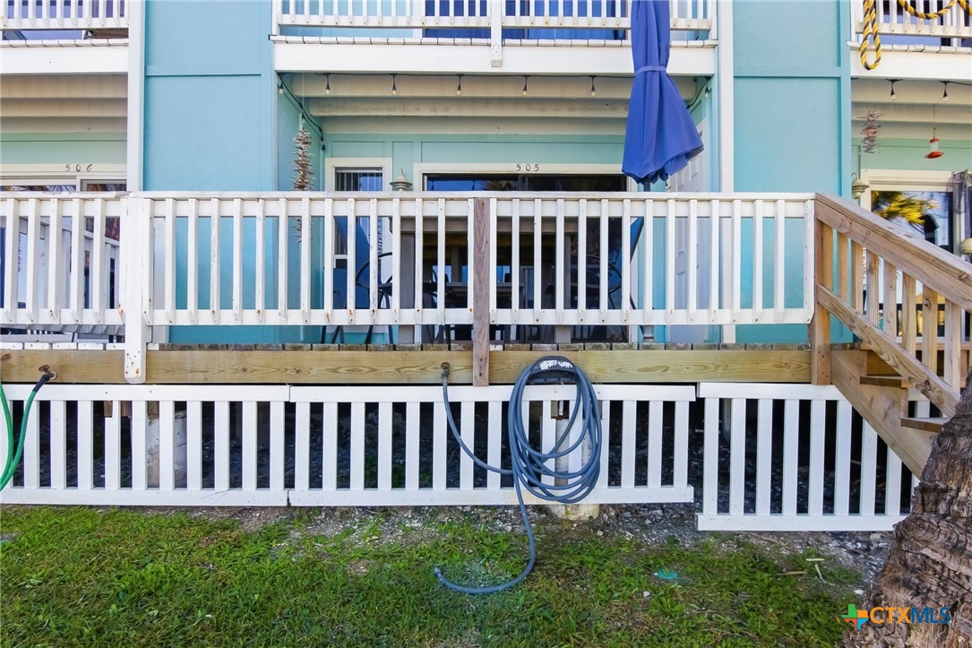 2292 North Fulton Beach Road, Unit 505 Rockport, TX 78382 - Photo 36 of 46 a view of a chair in a patio