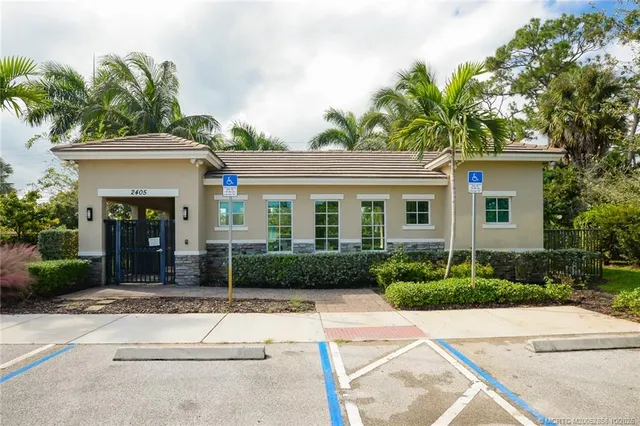 a view of a house with swimming pool