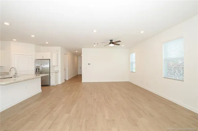 a view of a kitchen with a sink