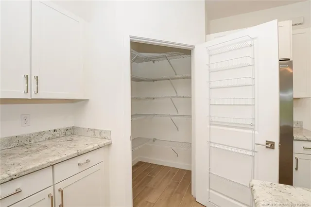 a kitchen with a cabinets and a stove