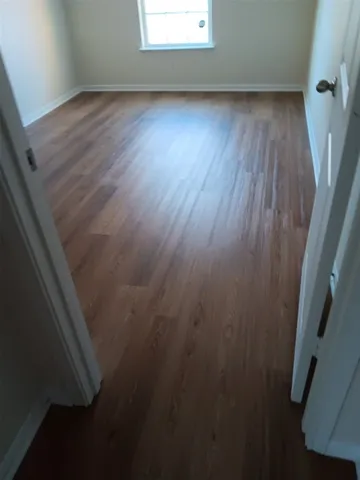 an empty room with a window