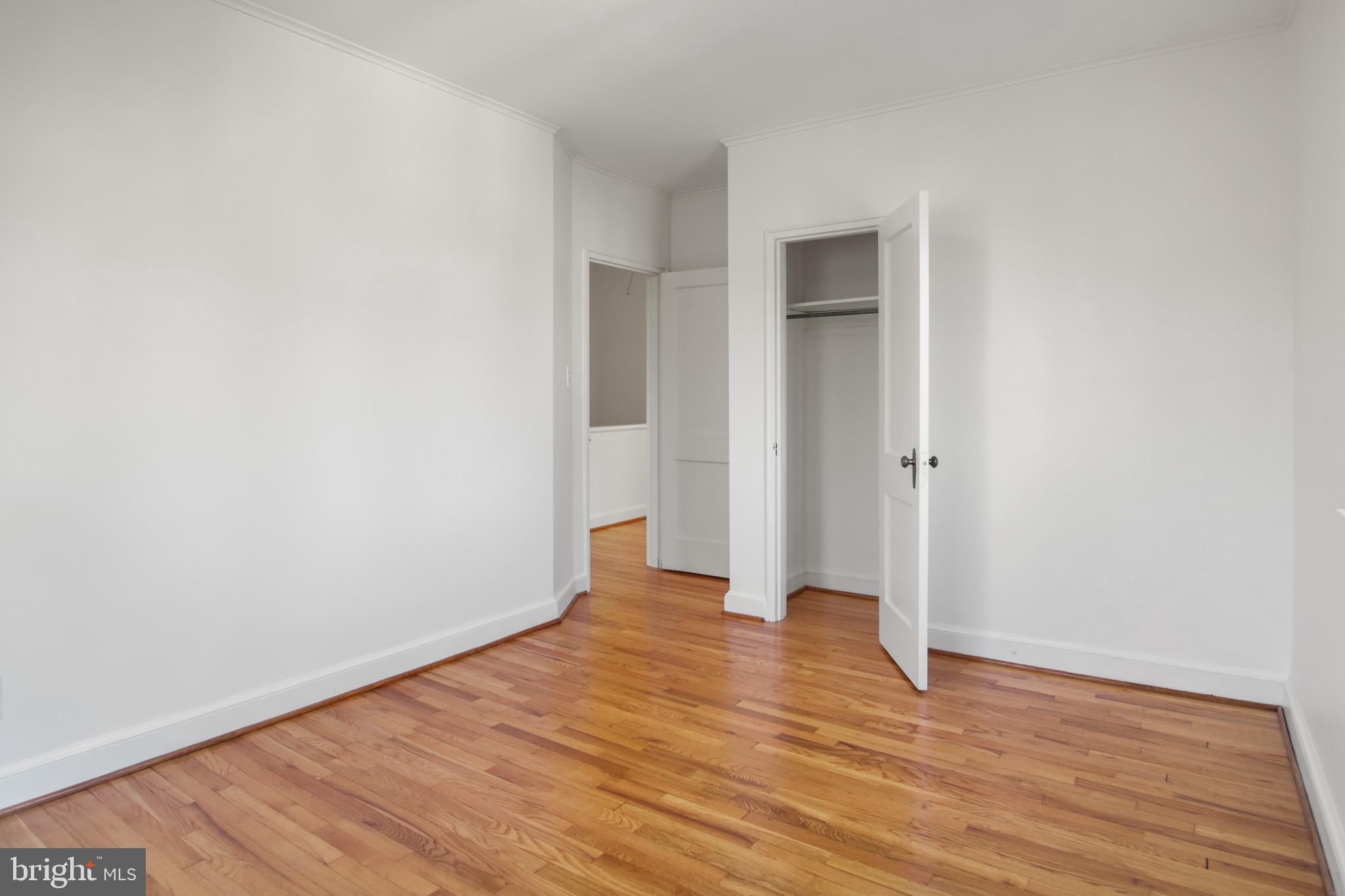 69 Aigburth Avenue Towson, MD 21286 - Photo 20 of 33 a view of an empty room with wooden floor