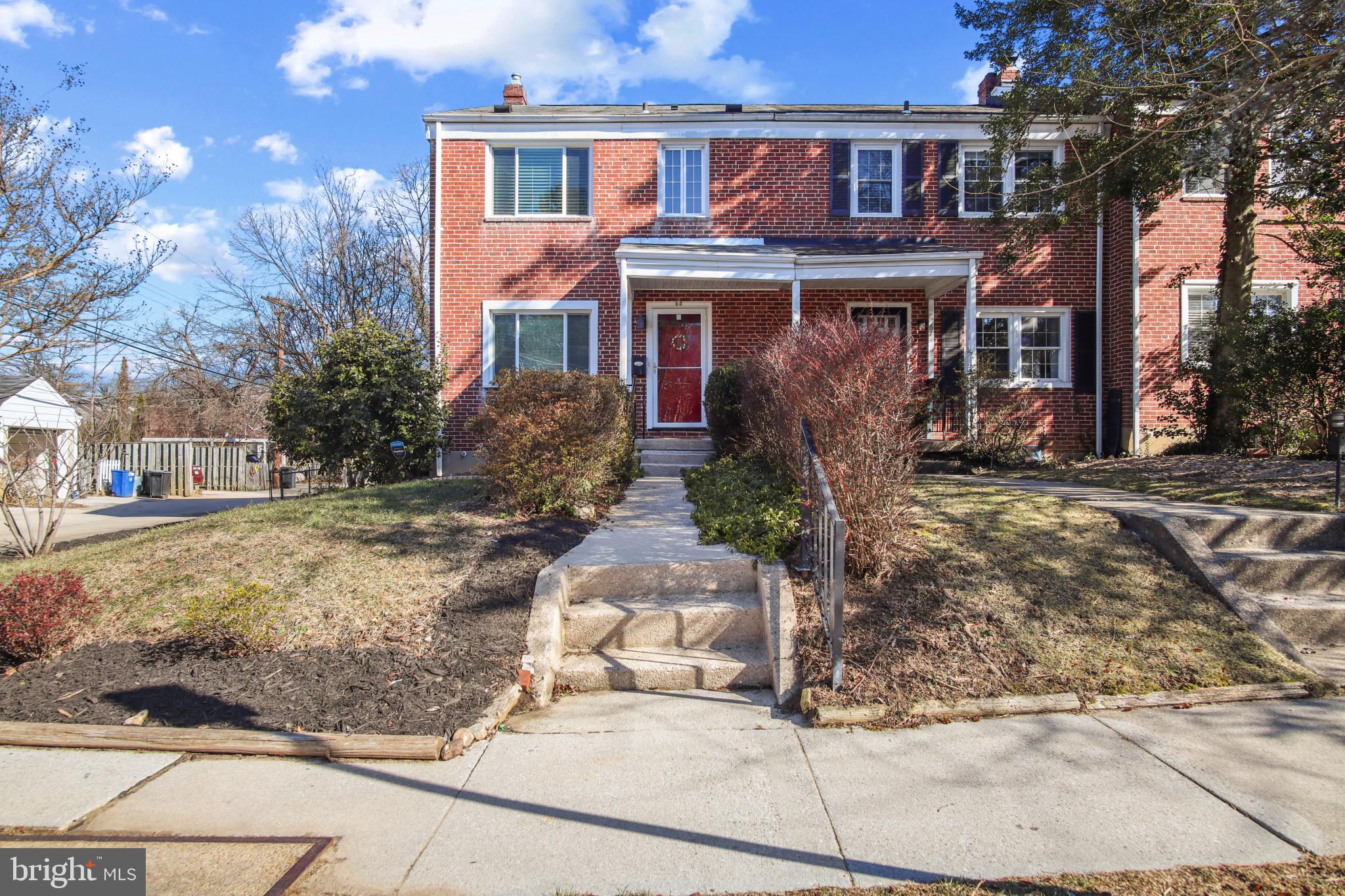 69 Aigburth Avenue Towson, MD 21286 - Photo 2 of 33 a front view of a house with garden