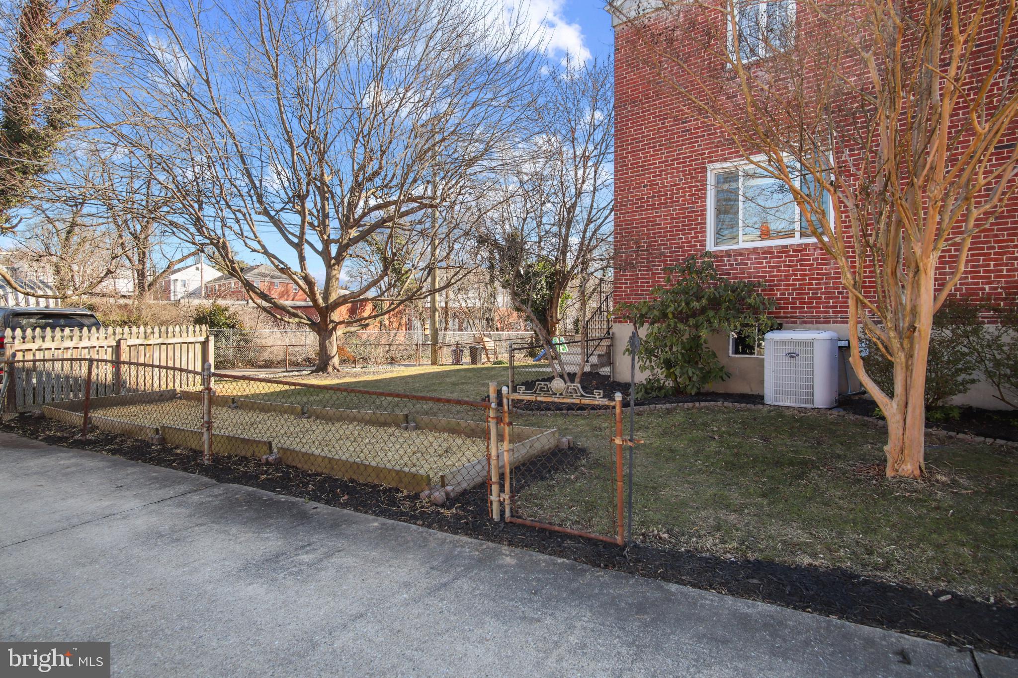 69 Aigburth Avenue Towson, MD 21286 - Photo 26 of 33 front view of a house with a yard