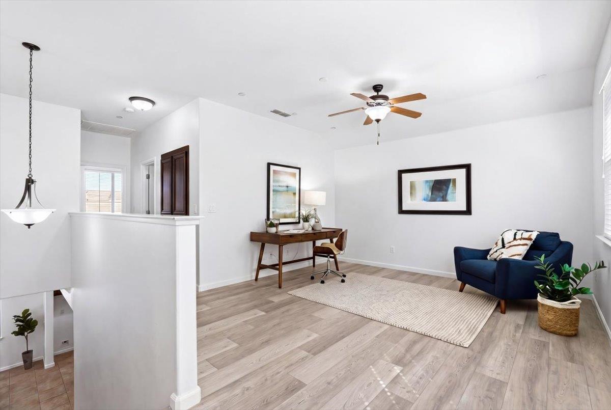 2036 Vignolia Loop Roseville, CA 95747 - Photo 23 of 27 a living room with furniture