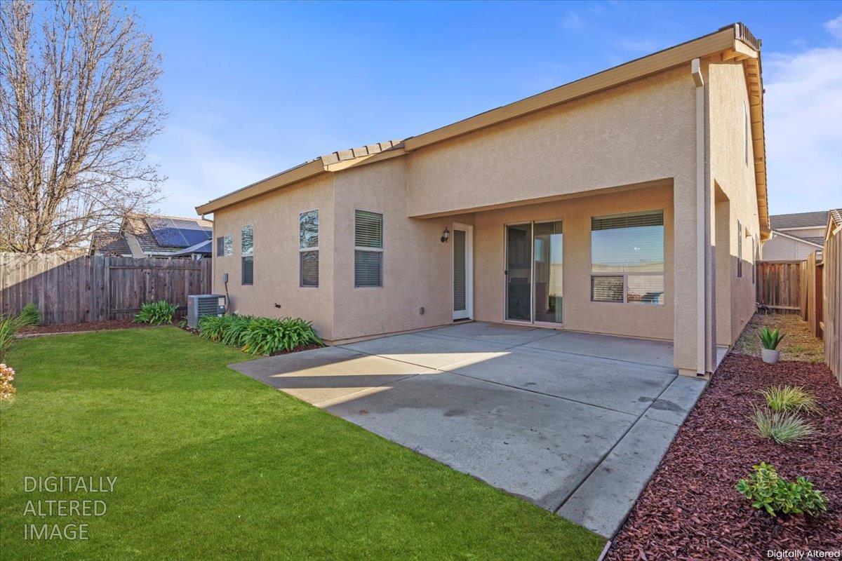 2036 Vignolia Loop Roseville, CA 95747 - Photo 28 of 33 Digitally altered. Grass does not look this good.