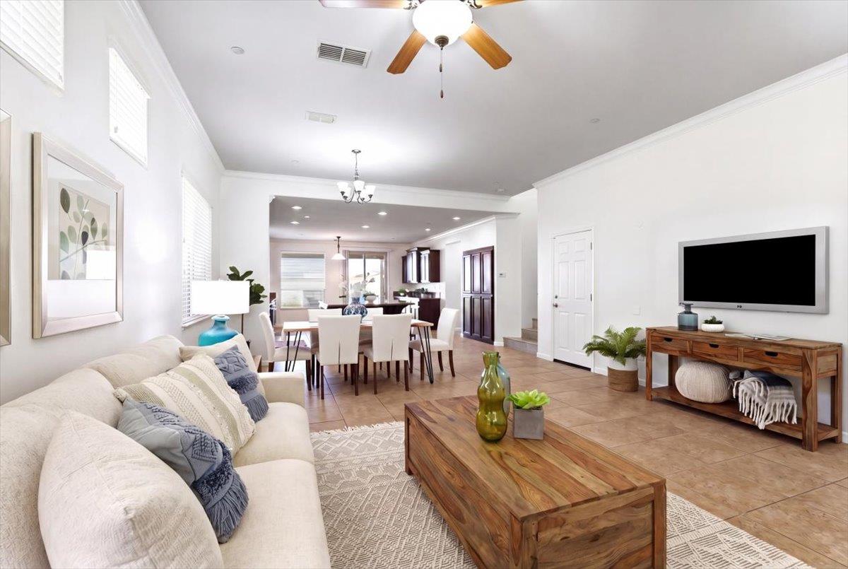 2036 Vignolia Loop Roseville, CA 95747 - Photo 5 of 27 a living room with furniture and a flat screen tv