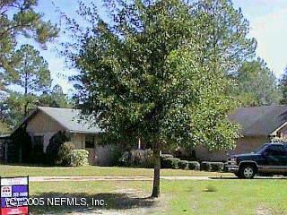 2070 Deer Run Road Callahan, FL 32011 - Photo 1 of 1 a view of a house with a yard