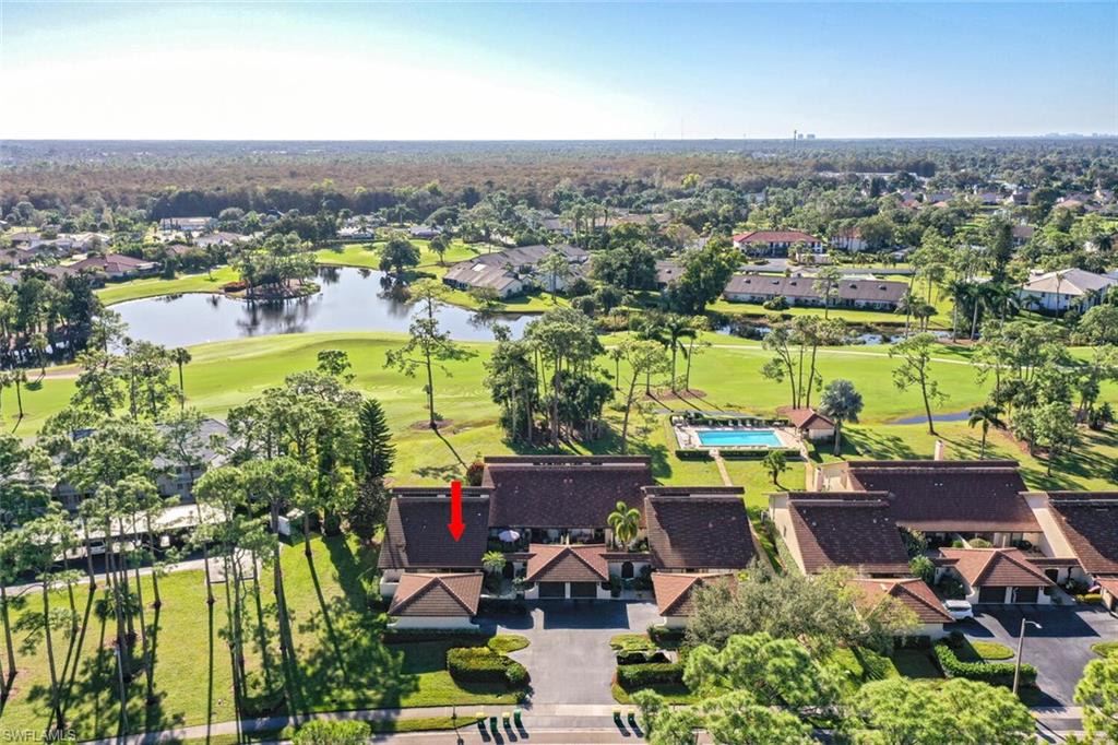 646 Augusta Boulevard Naples, FL 34113 - Photo 18 of 23 an aerial view of residential houses with outdoor space and river