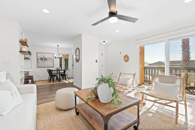 a living room with furniture and a table