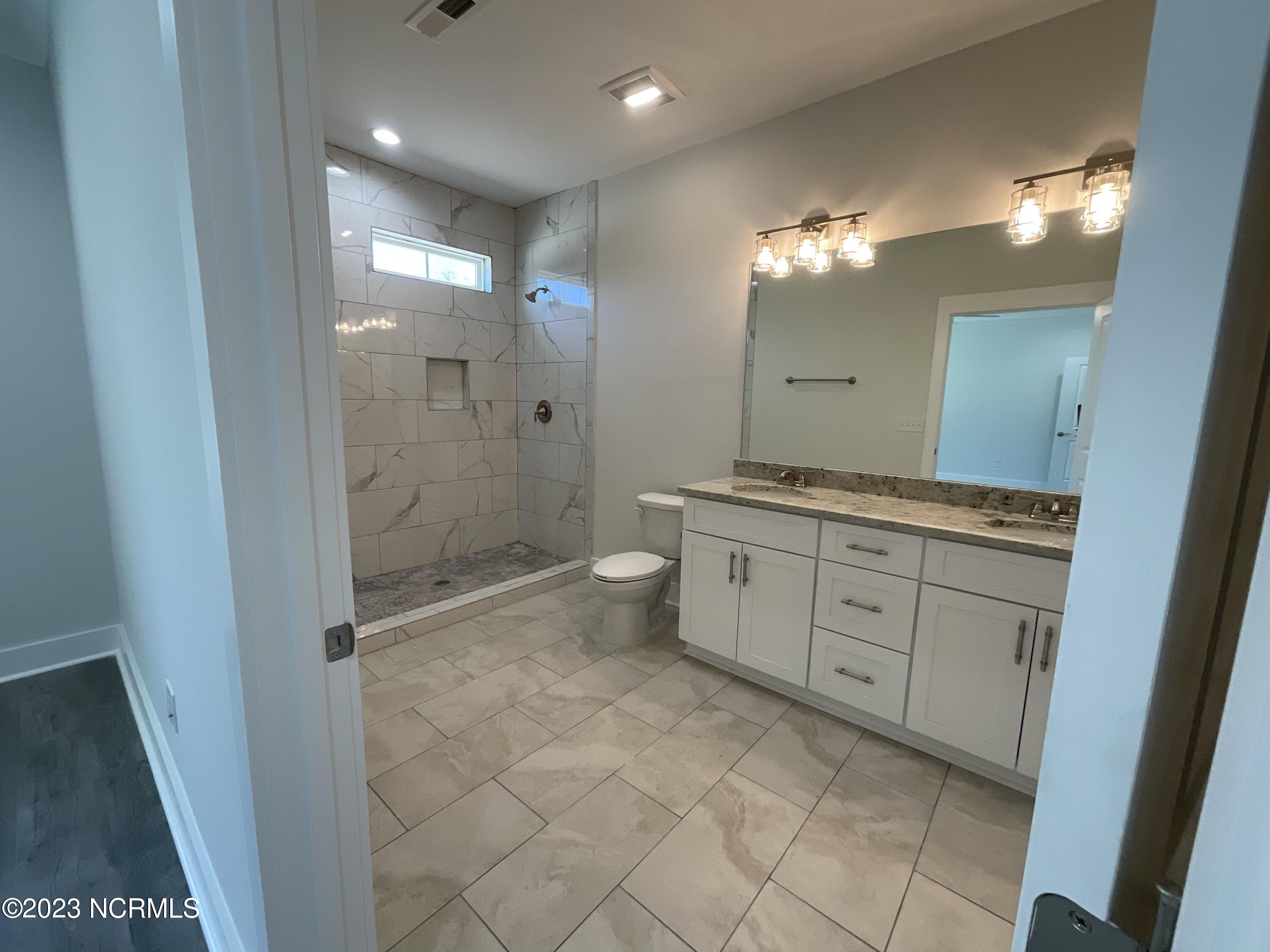 901 Nicklaus Road Boiling Spring Lakes, NC 28461 - Photo 20 of 33 Actual Master Bath
