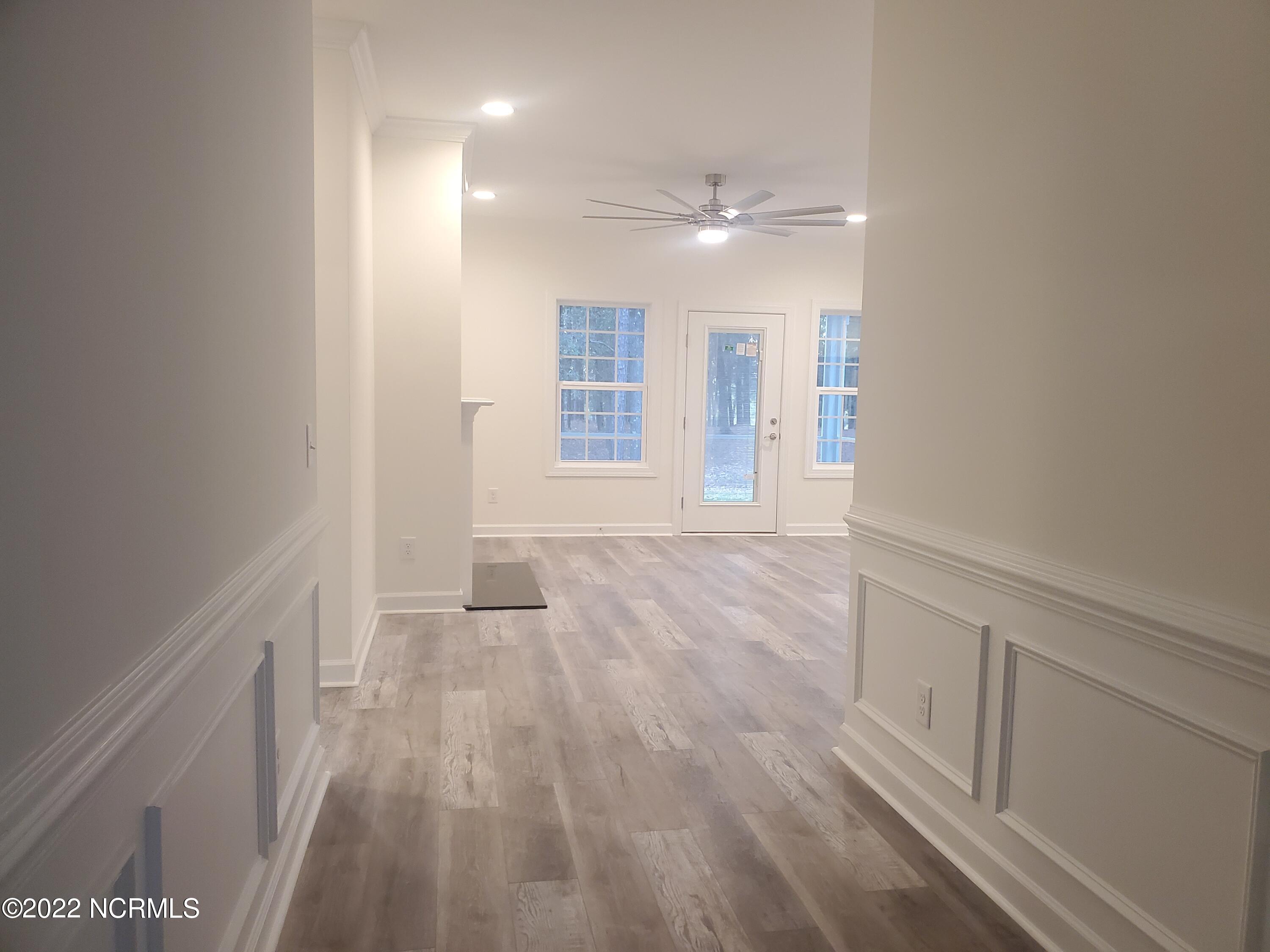 901 Nicklaus Road Boiling Spring Lakes, NC 28461 - Photo 23 of 33 Optional wainscoting foyer example