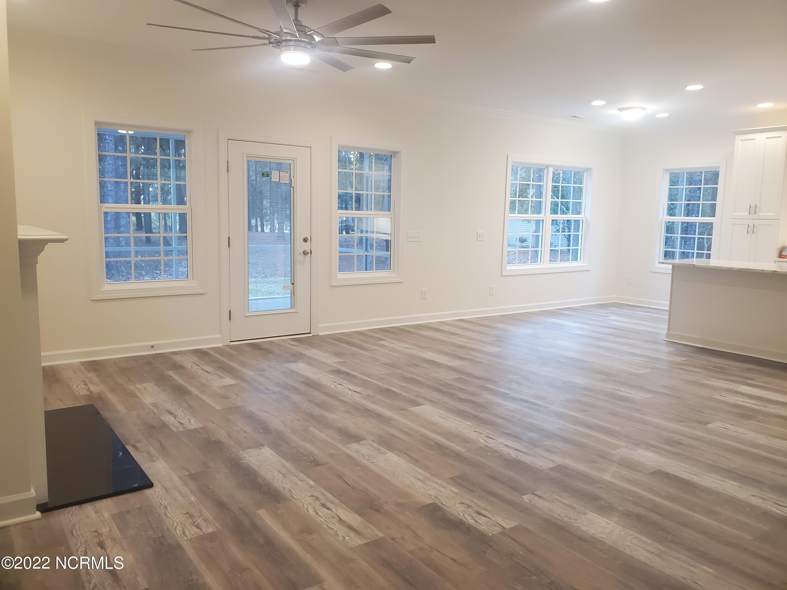 901 Nicklaus Road Boiling Spring Lakes, NC 28461 - Photo 24 of 33 Open Living dining and Kitchen