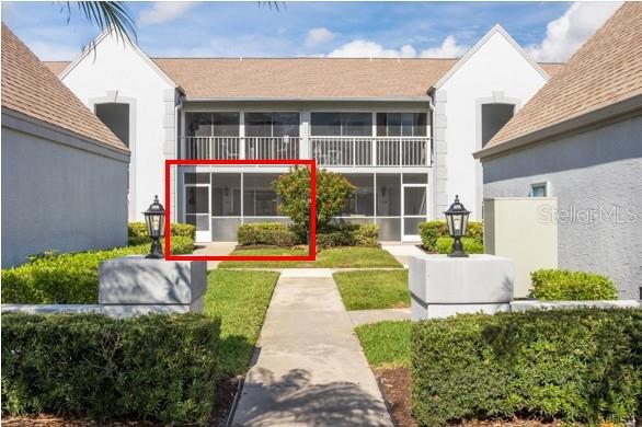 6713 Stone River Road, Unit 103 Bradenton, FL 34203 - Photo 2 of 86 a view of a house with backyard and garden