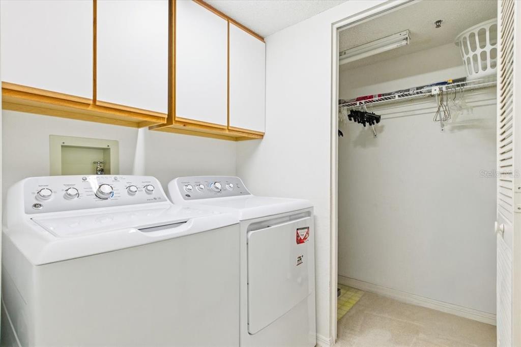 6713 Stone River Road, Unit 103 Bradenton, FL 34203 - Photo 41 of 86 a utility room with dryer and washer