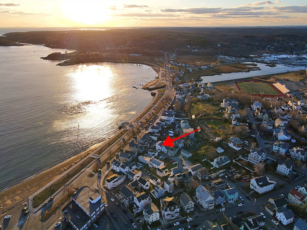 55 Mansfield Street, Unit A Gloucester, MA 01930 - Photo 18 of 18 a view of an ocean and beach