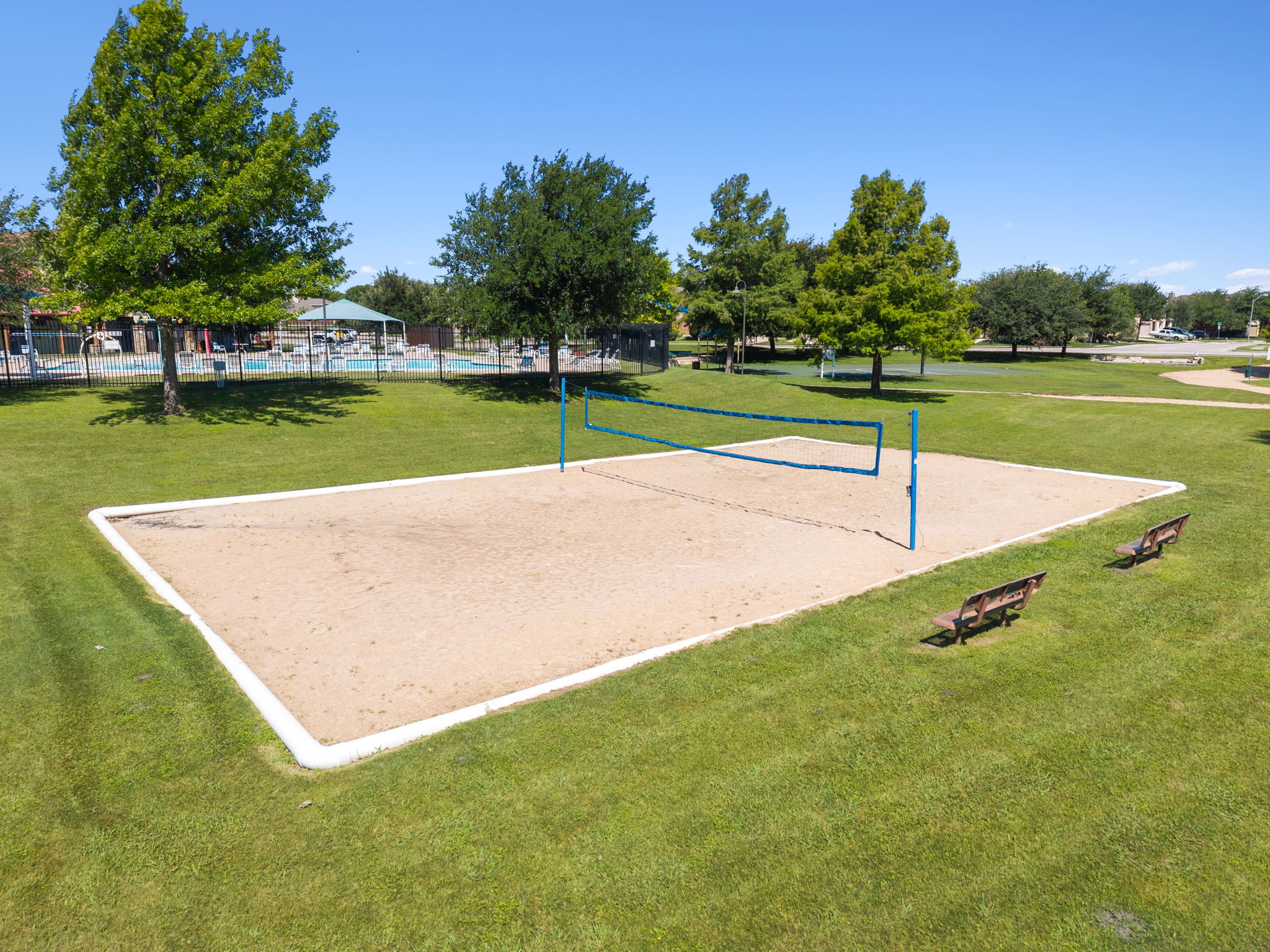 3101 Fresh Spring Road Pflugerville, TX 78660 - Photo 34 of 39 Sand volleyball court with a net gets use in this vibrant community.