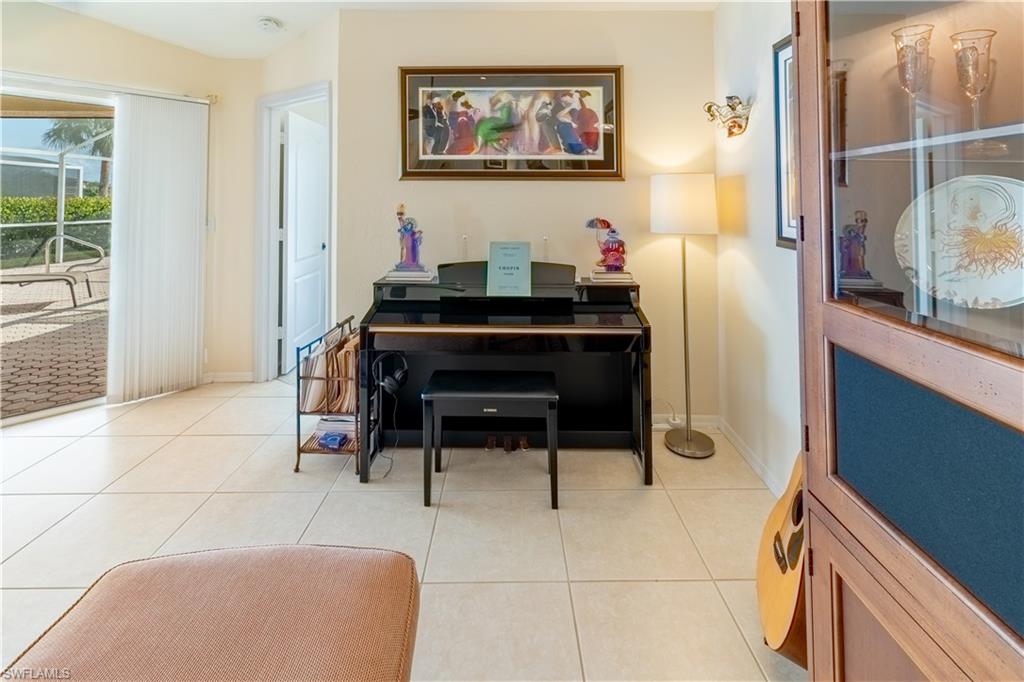 458 Countryside Drive Naples, FL 34104 - Photo 18 of 50 Sitting room featuring light tile patterned floors
