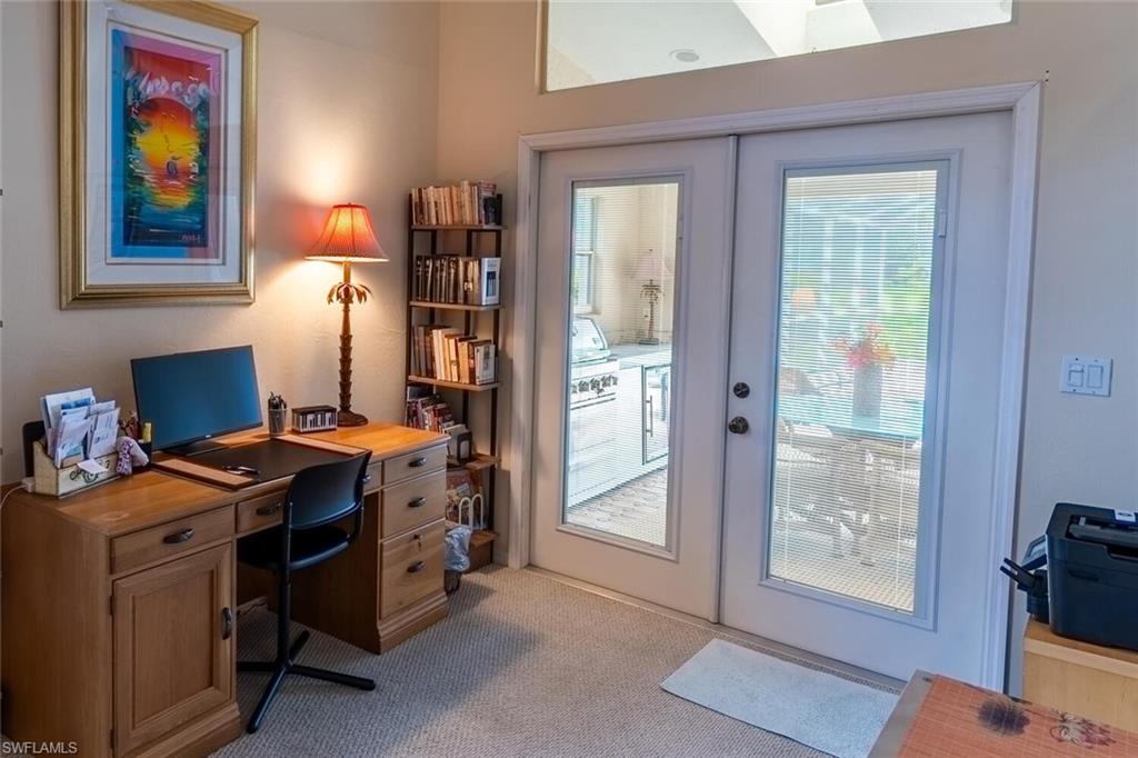 458 Countryside Drive Naples, FL 34104 - Photo 32 of 50 Office space featuring french doors, light colored carpet, and healthy amount of natural light