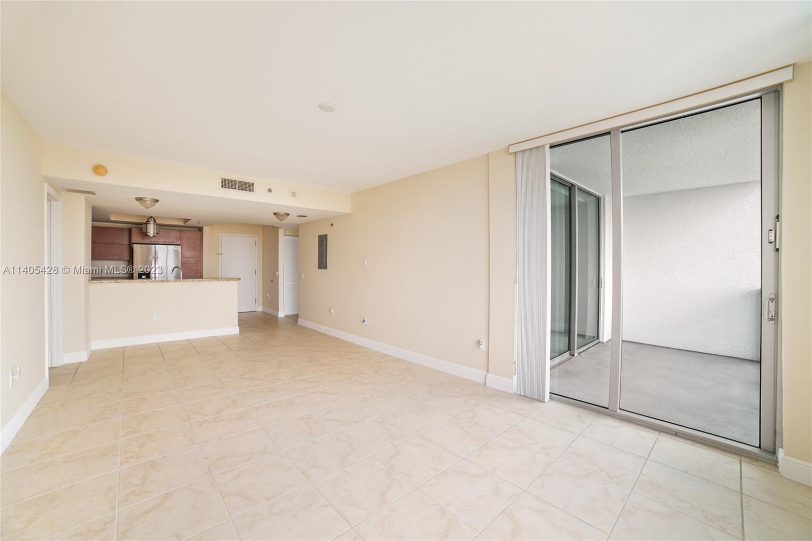 2681 North Flamingo Road, Unit 1906S Sunrise, FL 33323 - Photo 6 of 16 a view of a big room with closet and windows