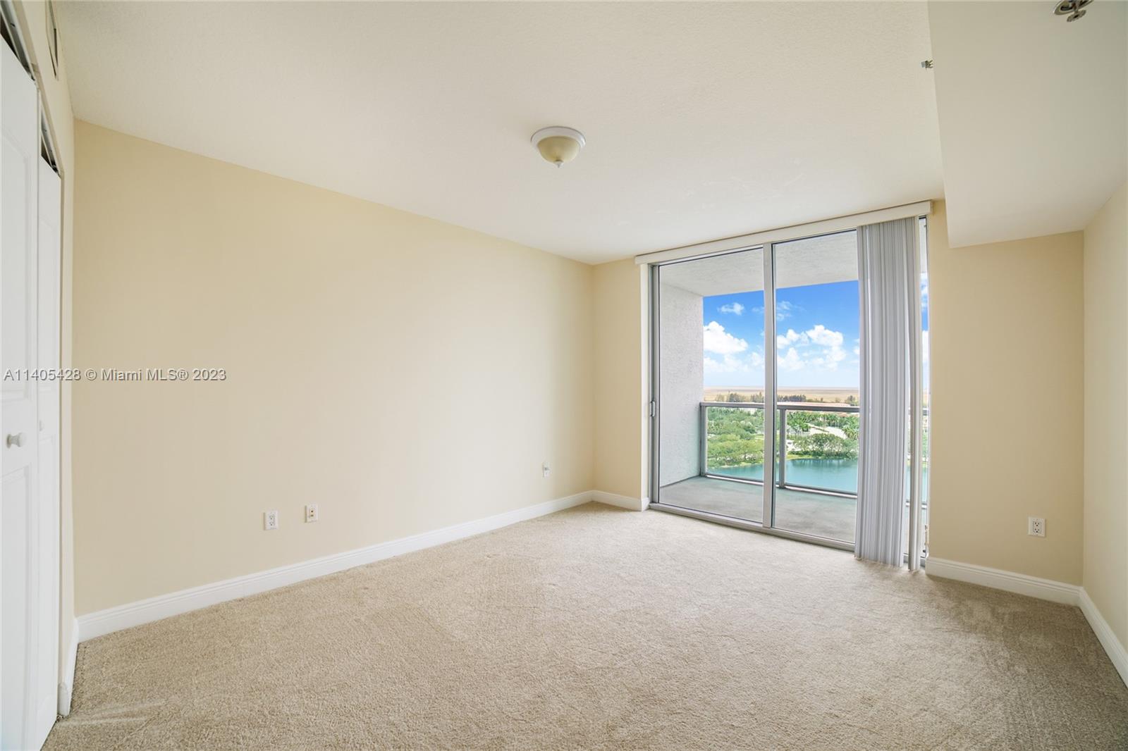2681 North Flamingo Road, Unit 1906S Sunrise, FL 33323 - Photo 9 of 16 a view of an empty room with glass door