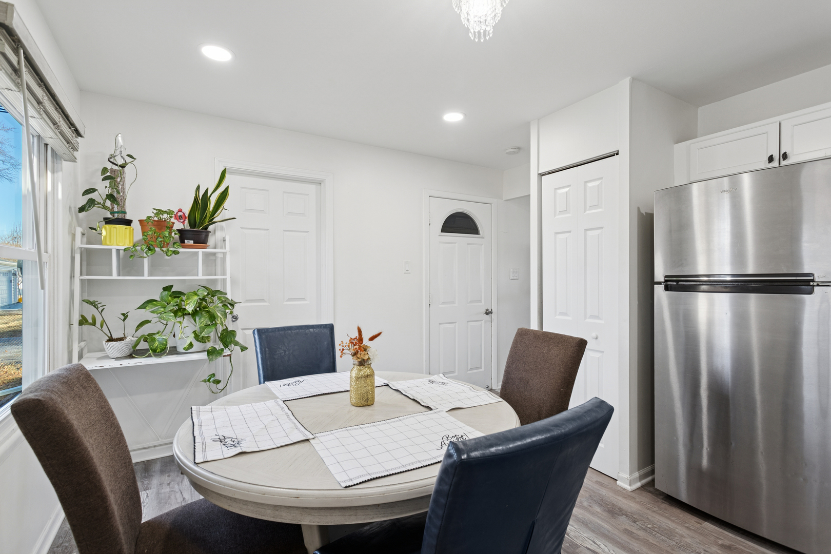 516 Dalhart Avenue Romeoville, IL 60446 - Photo 5 of 19 a view of a dining room with furniture window and wooden floor