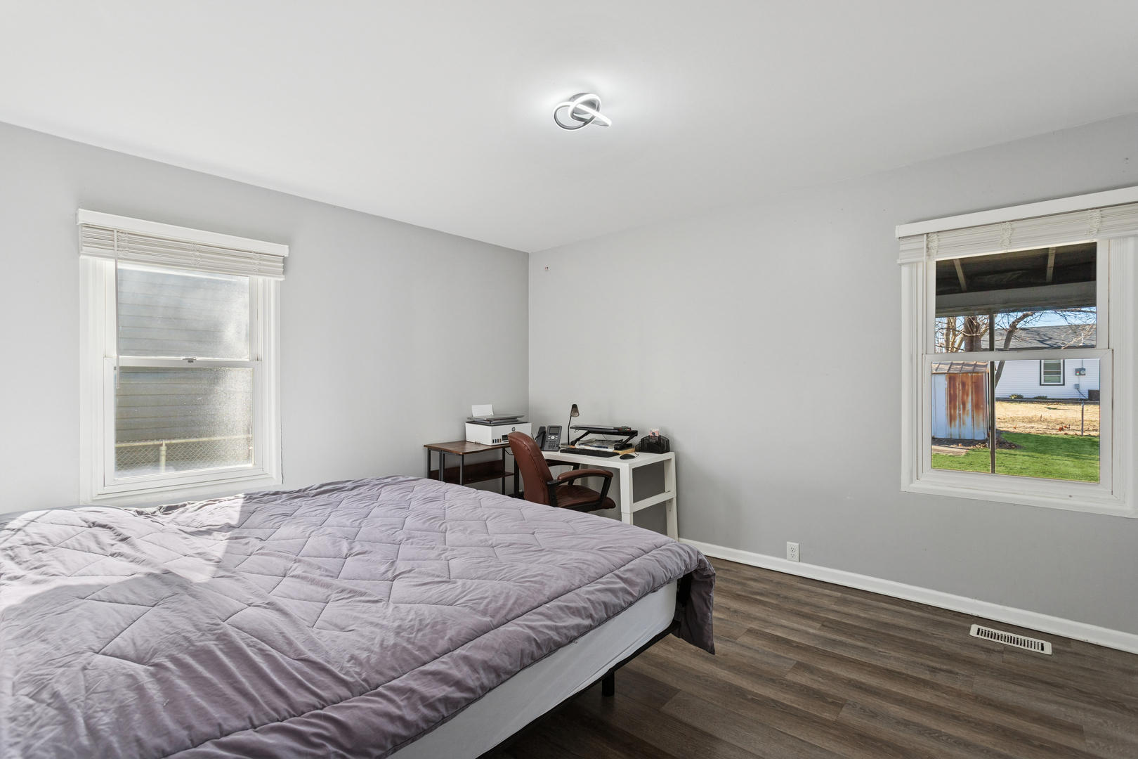 516 Dalhart Avenue Romeoville, IL 60446 - Photo 10 of 19 a bedroom with a bed and a window