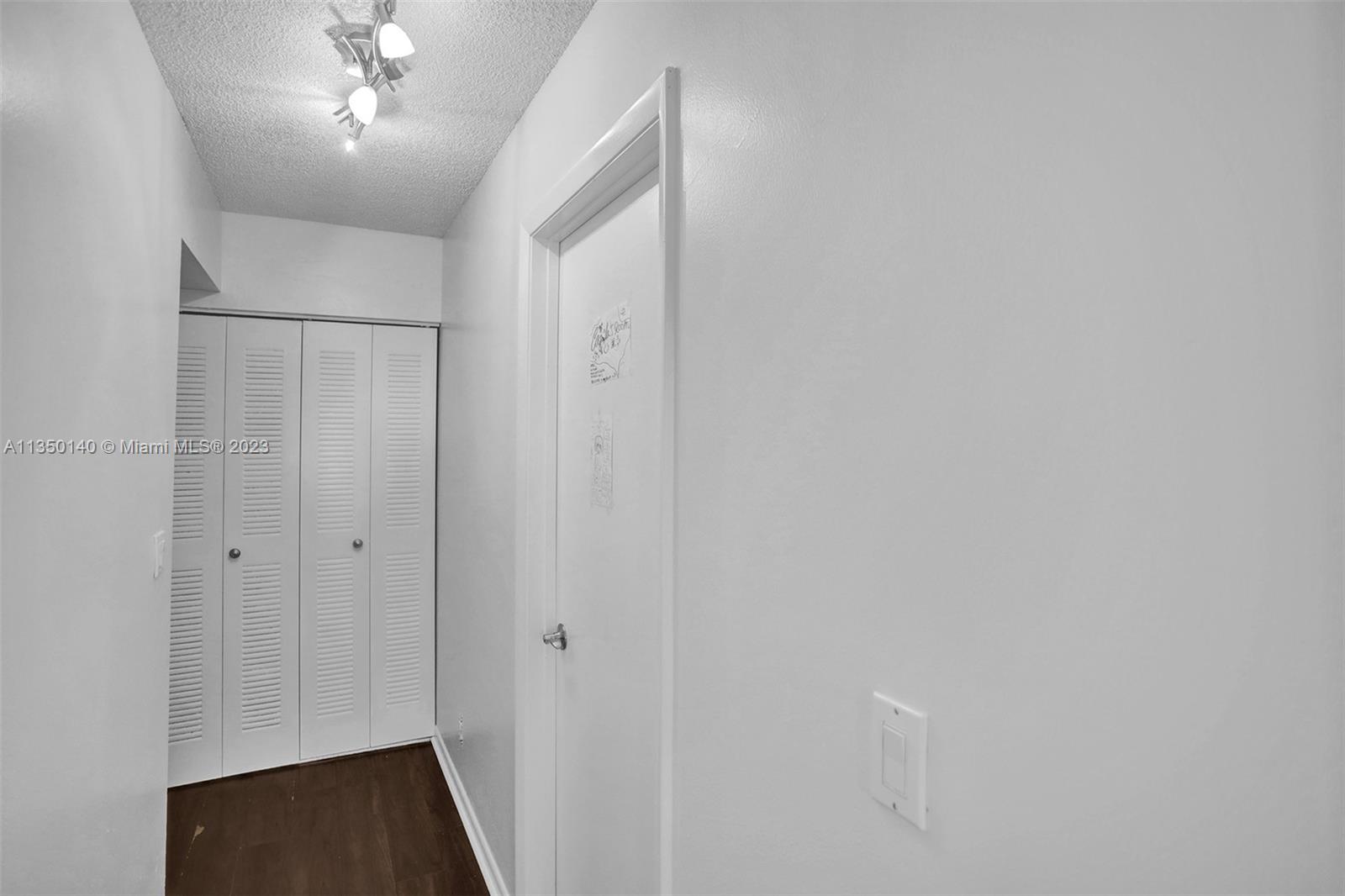 84 Springdale Circle Palm Springs, FL 33461 - Photo 15 of 32 a view of a hallway