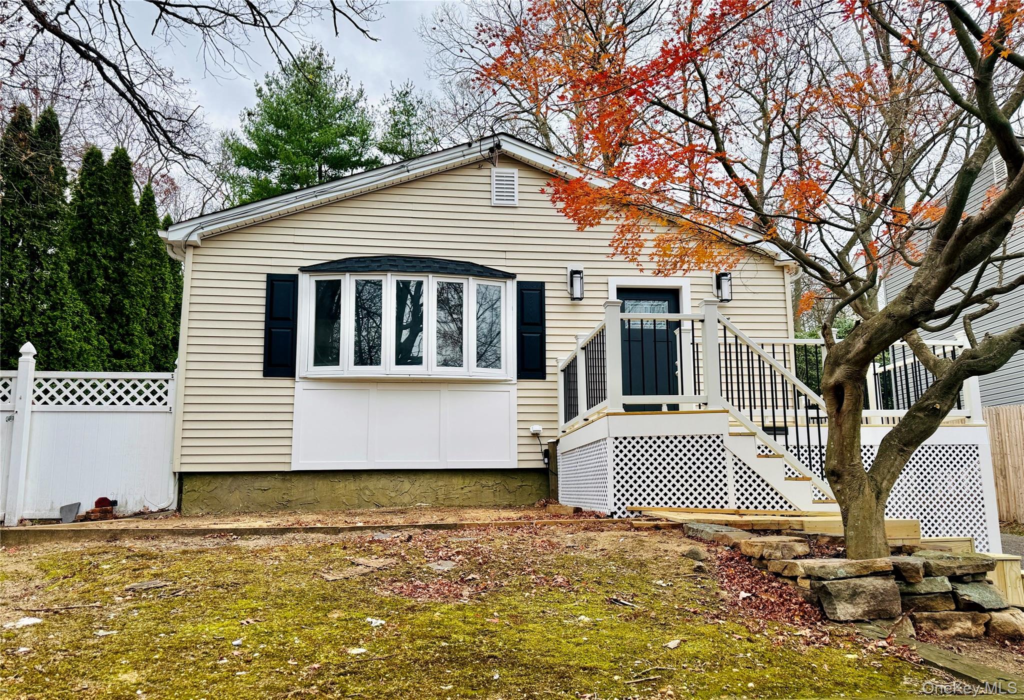 12 Hampton Road Sound Beach, NY 11789 - Photo 1 of 1 a front view of a house with a yard and garage