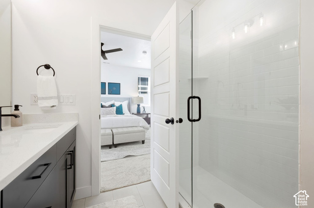 153 East Rochefort Court Sandy, UT 84070 - Photo 20 of 43 Primary bath. Glass-enclosed shower with subway tile surround