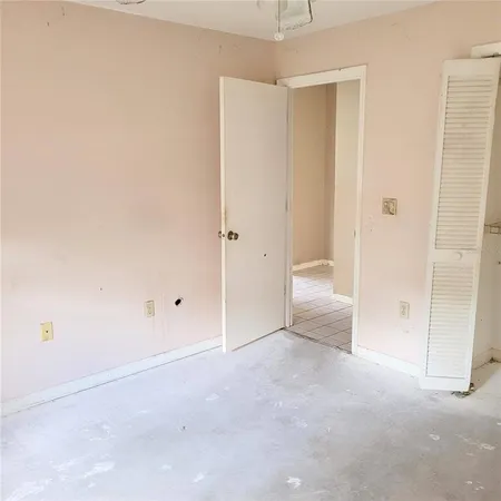 an empty room with a bathroom
