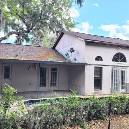 a front view of a house with garage