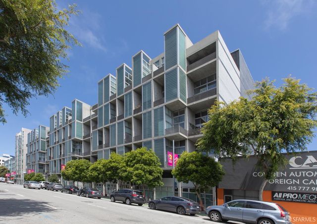 a front view of a building with street view