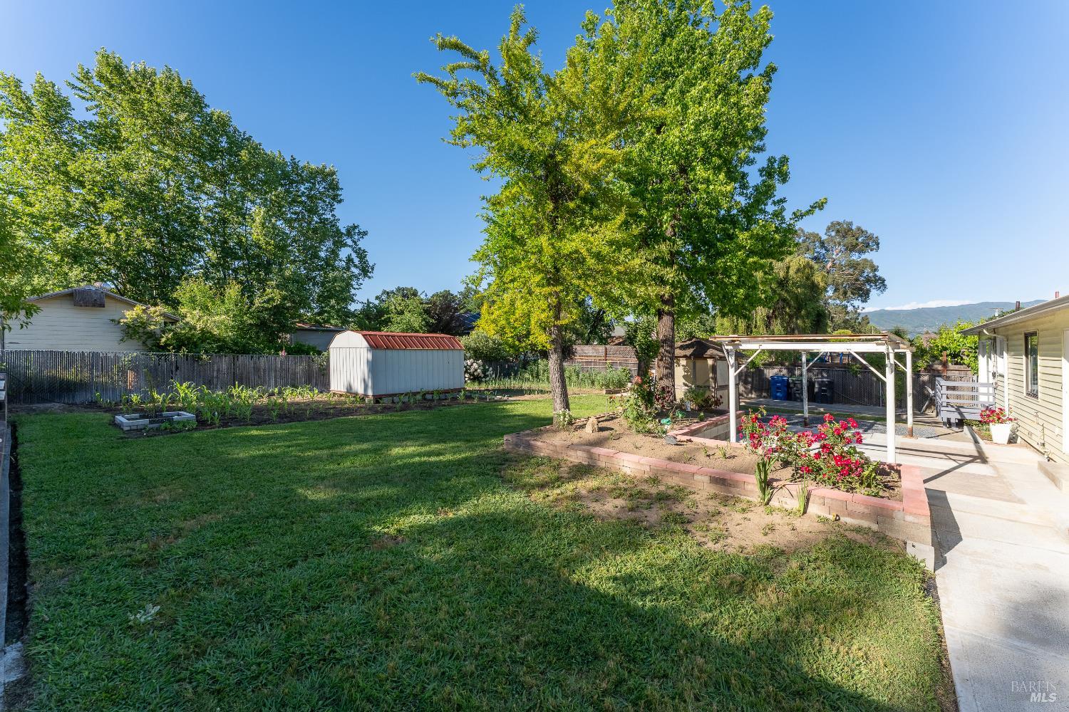 92 Oak Knoll Road Ukiah, CA 95482 - Photo 20 of 29 a view of a backyard with patio