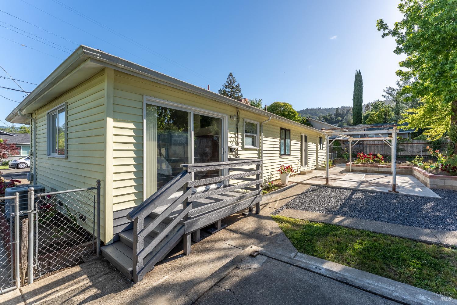 92 Oak Knoll Road Ukiah, CA 95482 - Photo 23 of 29 a front view of house with yard outdoor seating and barbeque oven