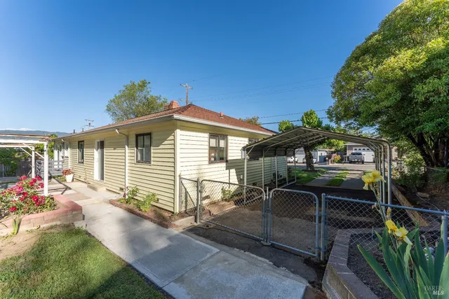 a front view of a house with patio