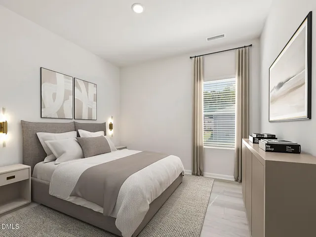 a kitchen with kitchen island a stove a refrigerator and a dining table with wooden floor