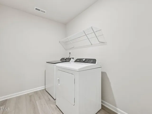 a view of a room with racks on the wall