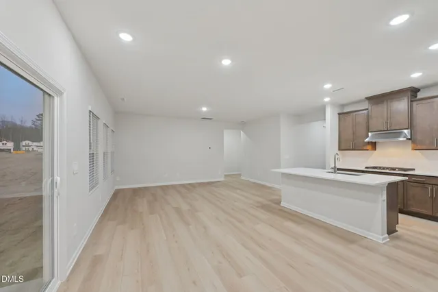 a black and white photo of a living room