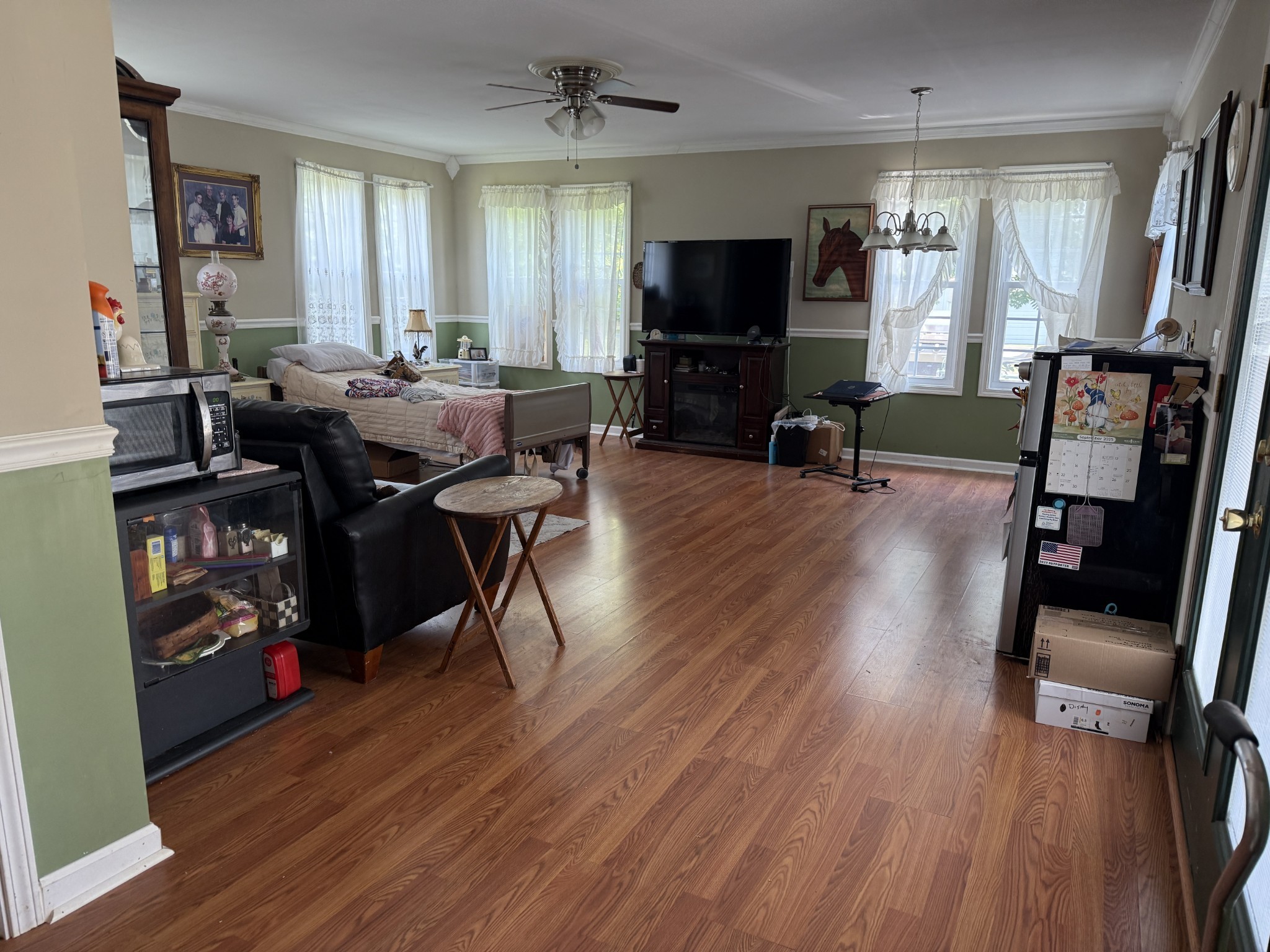 3371 Highway 76 Cottontown, TN 37048 - Photo 15 of 54 a view of a livingroom with furniture and a flat screen tv