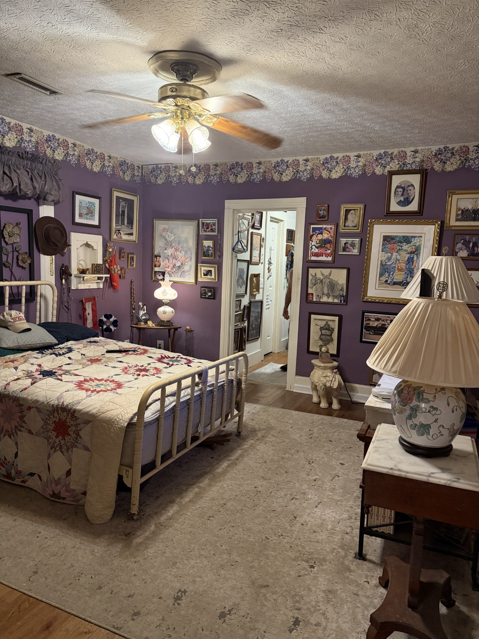 3371 Highway 76 Cottontown, TN 37048 - Photo 27 of 54 a bedroom with a bed a bookshelf and piano