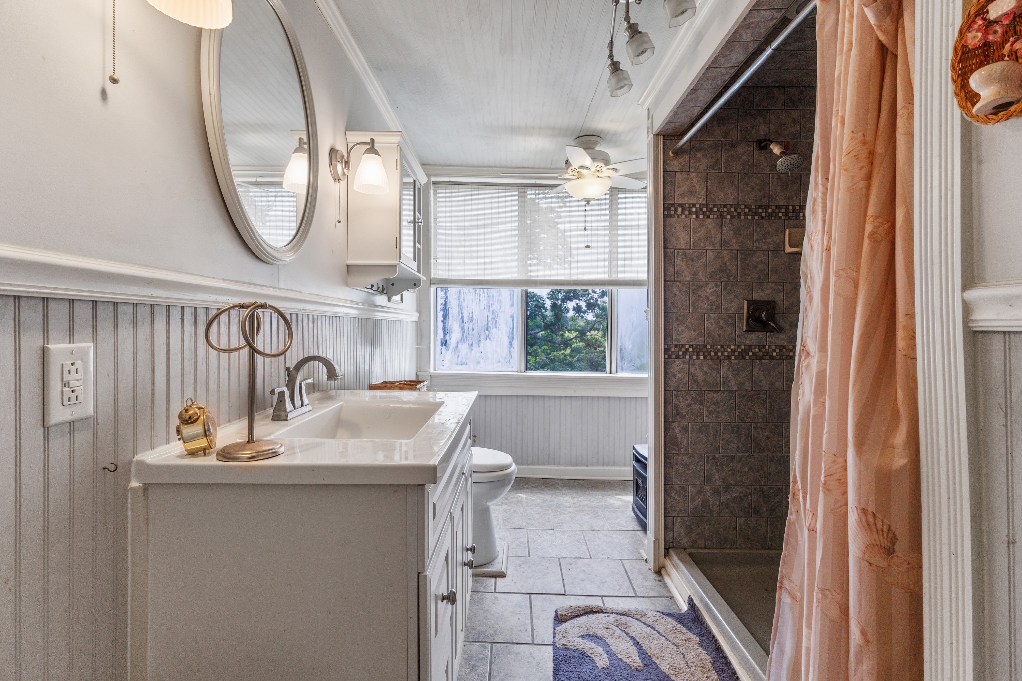3371 Highway 76 Cottontown, TN 37048 - Photo 36 of 54 a bathroom with a sink vanity mirror and tub