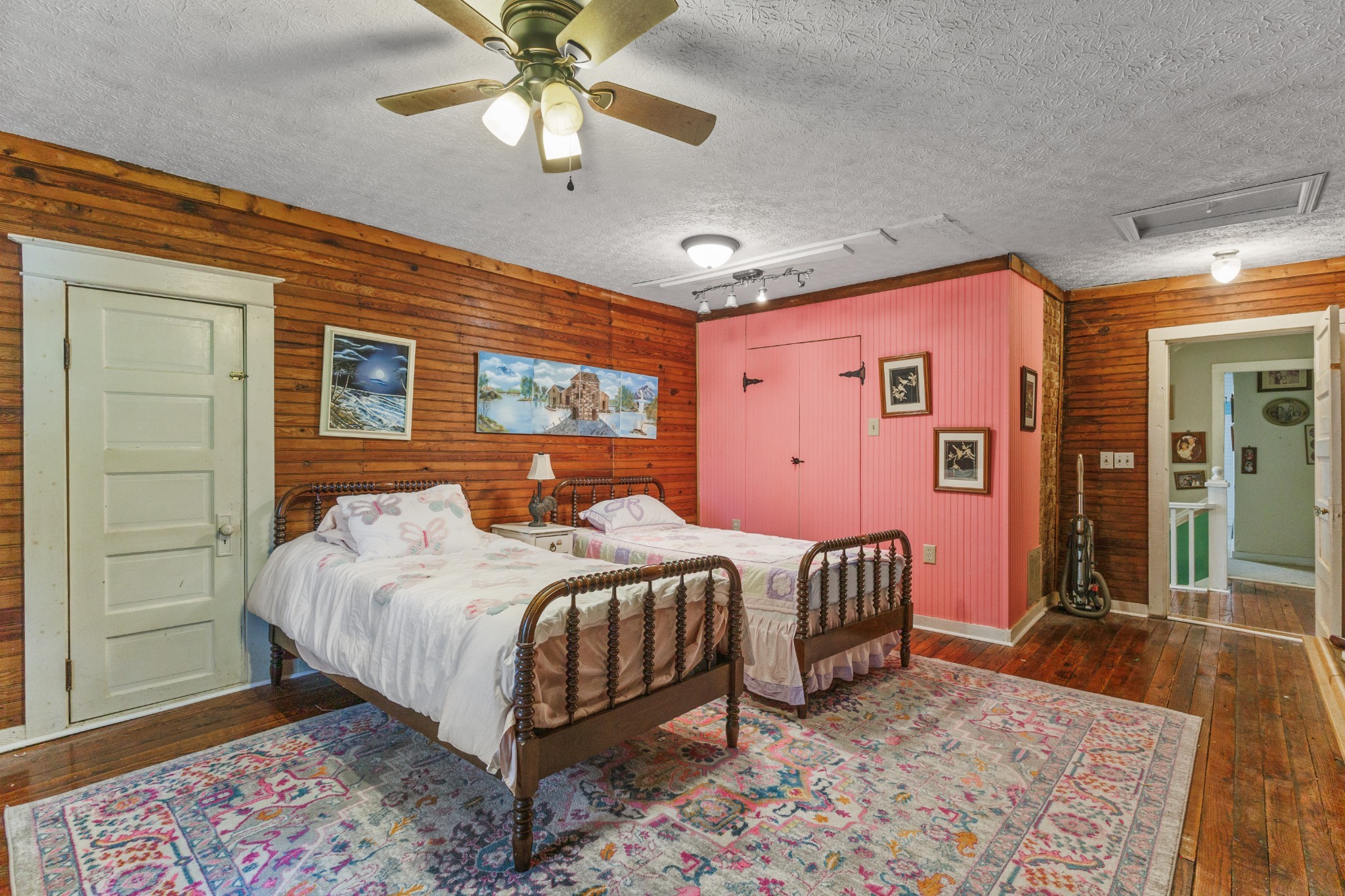 3371 Highway 76 Cottontown, TN 37048 - Photo 37 of 54 a bedroom with a bed and a chandelier