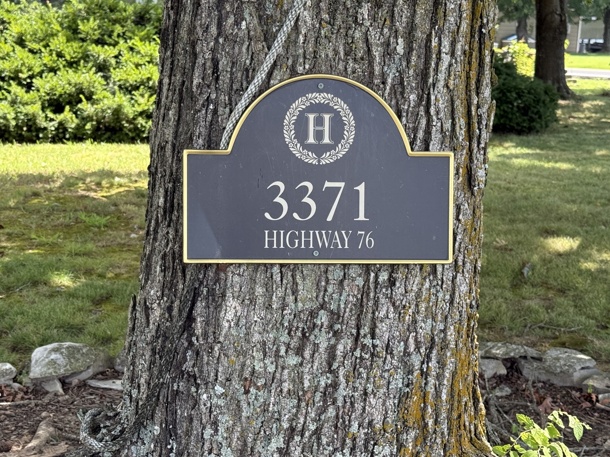 3371 Highway 76 Cottontown, TN 37048 - Photo 8 of 54 a sign that is on the side of a building