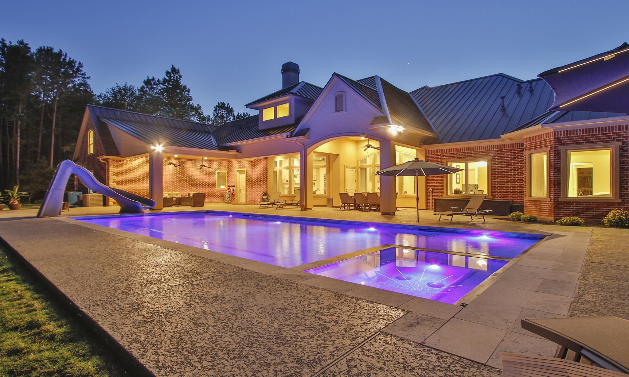 36702 Deer Valley Magnolia, TX 77355 - Photo 44 of 46 a view of swimming pool with a lounge chairs
