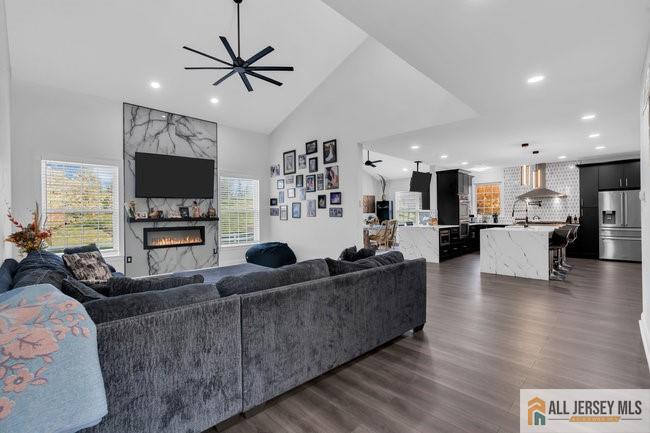 43 Meadow Run Road Bordentown, NJ 08505 - Photo 11 of 52 a living room with furniture kitchen view and a flat screen tv