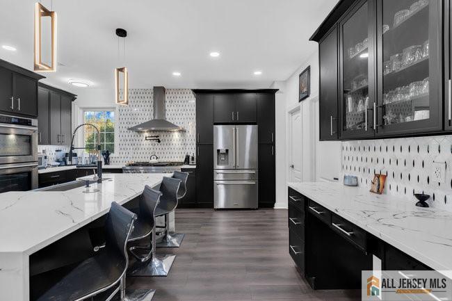 43 Meadow Run Road Bordentown, NJ 08505 - Photo 16 of 52 a kitchen with stainless steel appliances kitchen island granite countertop a sink counter space and cabinets