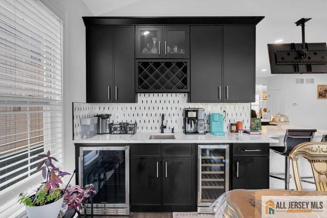 43 Meadow Run Road Bordentown, NJ 08505 - Photo 26 of 52 a kitchen with stainless steel appliances a sink and a stove