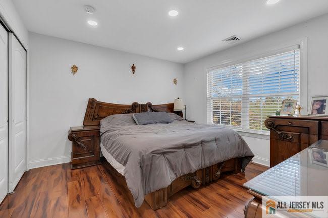 43 Meadow Run Road Bordentown, NJ 08505 - Photo 31 of 52 a bedroom with a bed and wooden floor