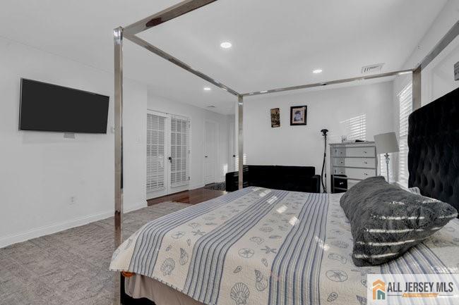 43 Meadow Run Road Bordentown, NJ 08505 - Photo 36 of 52 a bedroom with a bed and a television